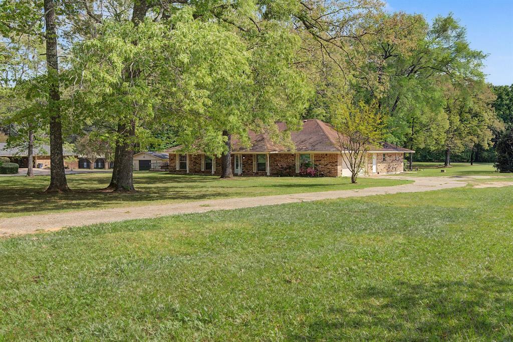 8849 Shirley Francis Road Shreveport, LA 71129 - Photo 1 of 1 a front view of a house with a yard