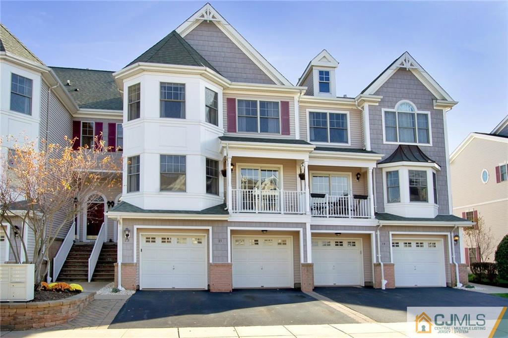 21 Raritan Reach Road, Unit 11 South Amboy, NJ 08879 - Photo 1 of 28 a front view of multiple houses