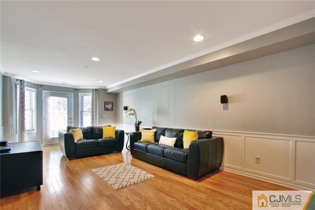 21 Raritan Reach Road, Unit 11 South Amboy, NJ 08879 - Photo 16 of 28 a living room with furniture and a couch