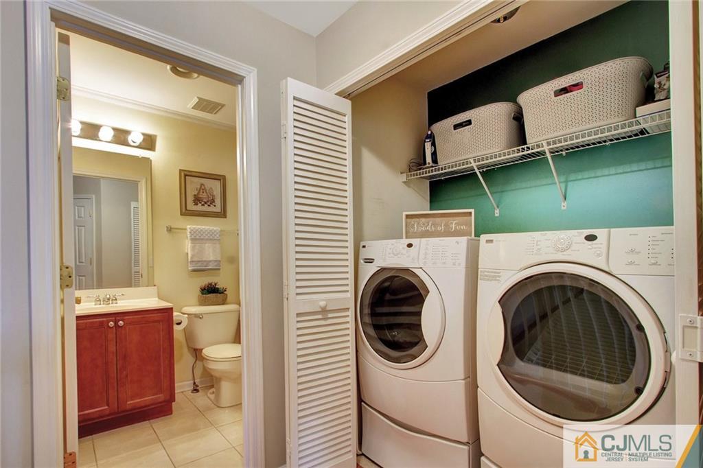 21 Raritan Reach Road, Unit 11 South Amboy, NJ 08879 - Photo 22 of 28 a room with a washer and dryer