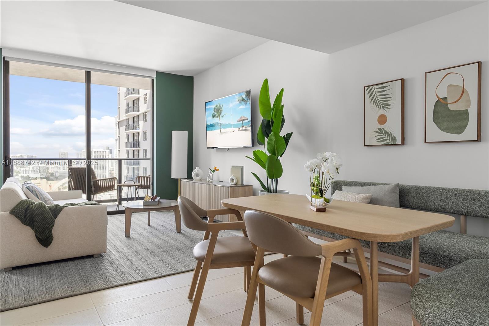 159 Northeast 6th Street, Unit 3013 Miami, FL 33132 - Photo 11 of 53 a view of a livingroom with furniture and a potted plant