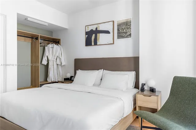 a bathroom with a sink mirror toilet and bathtub