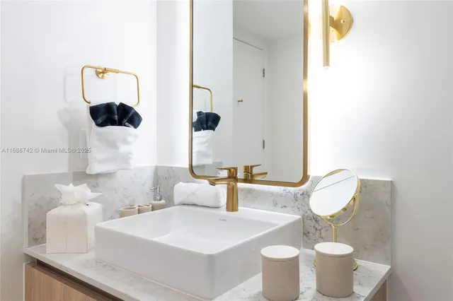 a view of a balcony with chair and potted plant