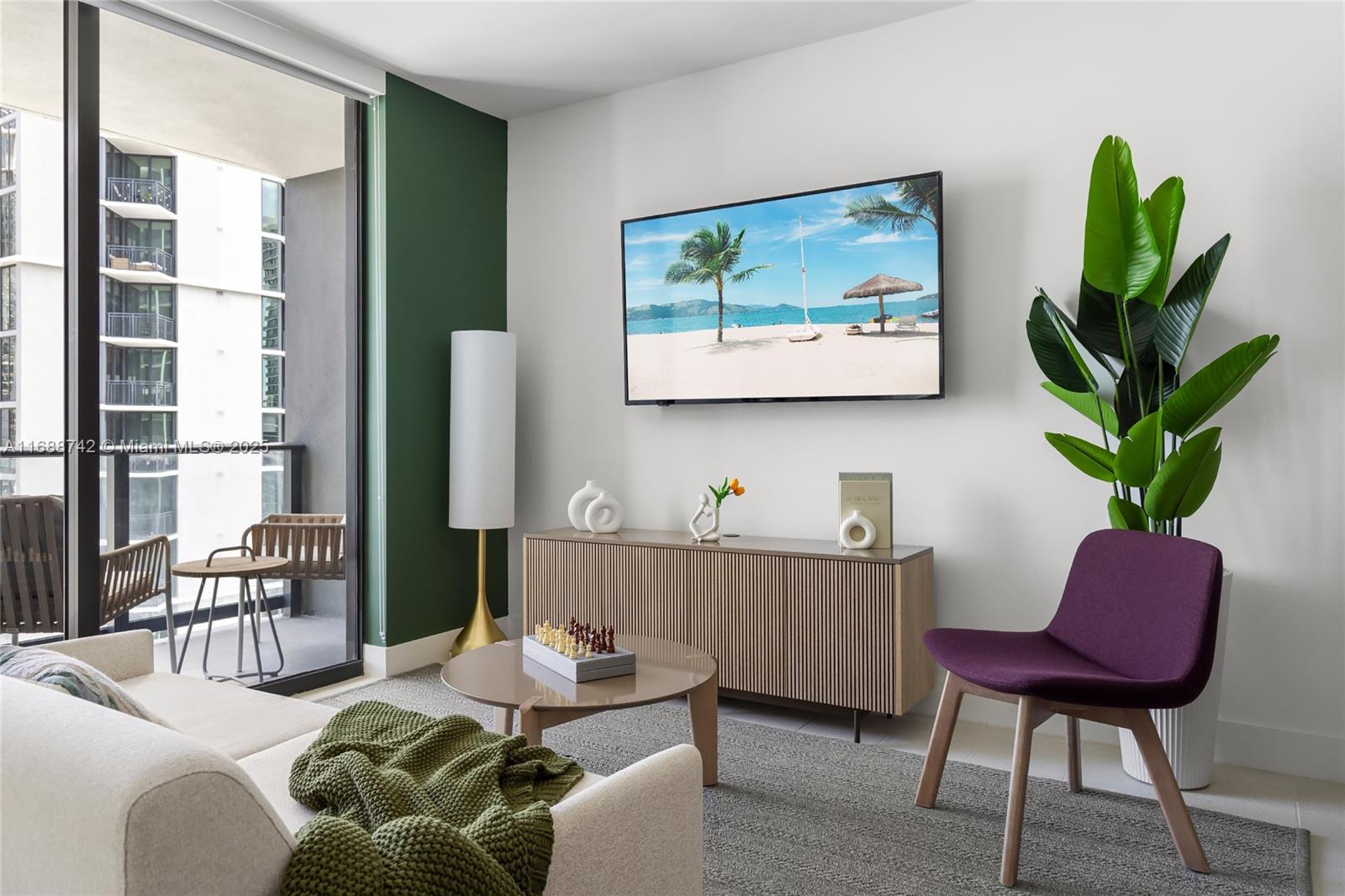 159 Northeast 6th Street, Unit 3013 Miami, FL 33132 - Photo 2 of 53 a living room with furniture plant and a window