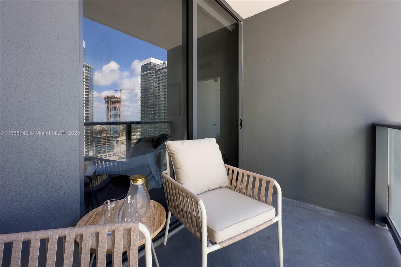 159 Northeast 6th Street, Unit 3013 Miami, FL 33132 - Photo 22 of 53 a view of balcony with furniture