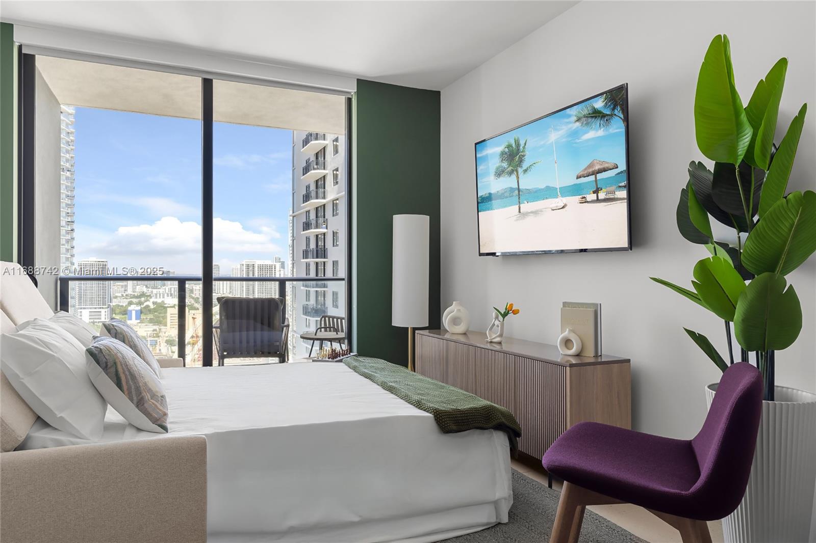 159 Northeast 6th Street, Unit 3013 Miami, FL 33132 - Photo 3 of 53 a bedroom with a large bed and a window