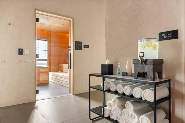 a bathroom with a tub and a shower