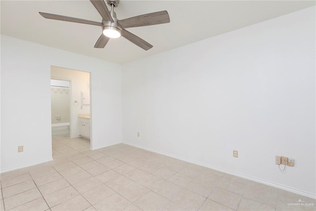 600 Toronto Avenue, Unit 14 McAllen, TX 78503 - Photo 7 of 14 Unfurnished room with light tile patterned floors and ceiling fan