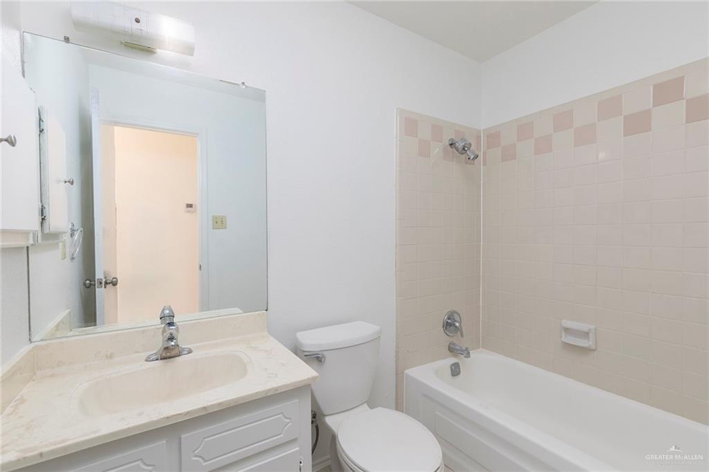 600 Toronto Avenue, Unit 14 McAllen, TX 78503 - Photo 10 of 14 Full bath featuring shower combination and vanity