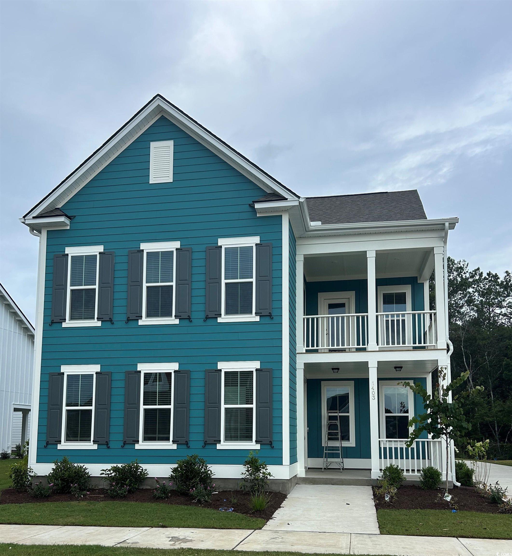 1403 Lancaster Way Myrtle Beach, SC 29588 - Photo 1 of 1 View of front of home featuring a balcony and cove