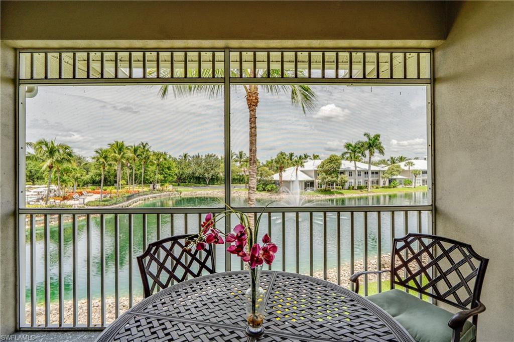 7930 Mahogany Run Lane, Unit 824 Naples, FL 34113 - Photo 26 of 40 a balcony view with a garden space
