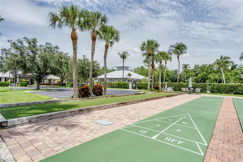7930 Mahogany Run Lane, Unit 824 Naples, FL 34113 - Photo 30 of 40 a view of a park with palm trees