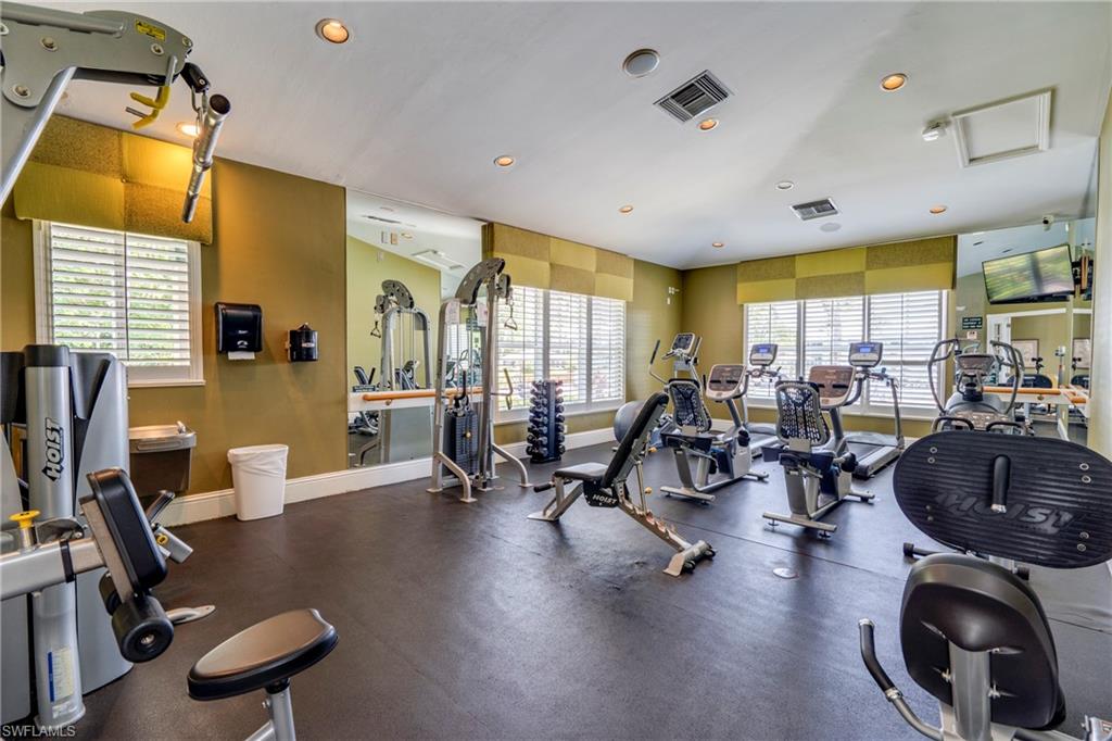 7930 Mahogany Run Lane, Unit 824 Naples, FL 34113 - Photo 35 of 40 a view of a room with gym equipment