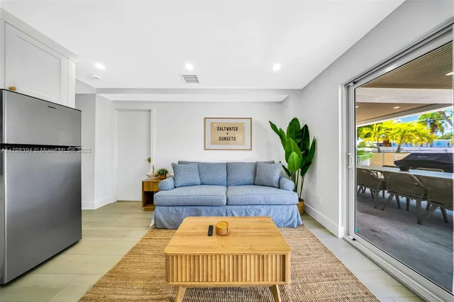 a bathroom with a sink mirror vanity and toilet