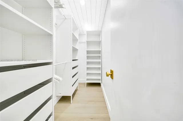 a view of roof deck with furniture