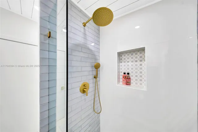 a view of a house with a tree in the background