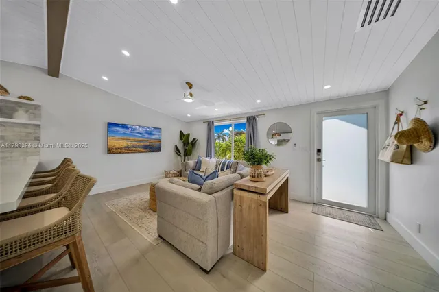 a view of kitchen with wooden floor and window