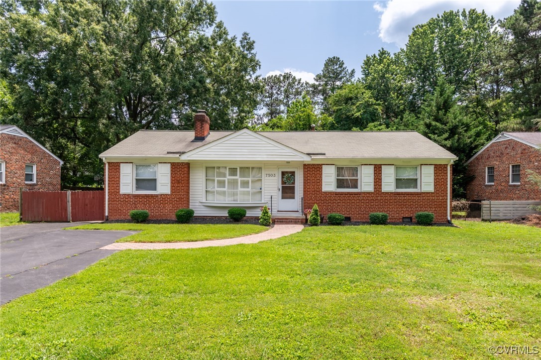 7503 Comet Road Henrico, VA 23294 - Photo 1 of 21 View of front of house with brick siding, a chimne