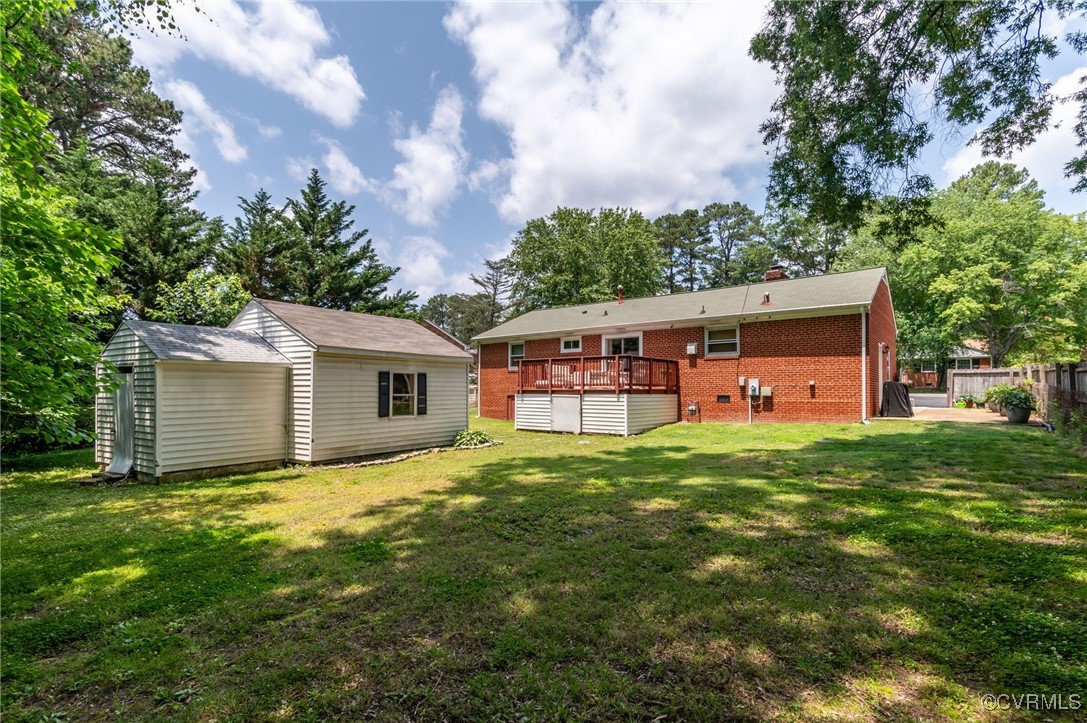 7503 Comet Road Henrico, VA 23294 - Photo 19 of 21 Back of property with a wooden deck, brick siding,