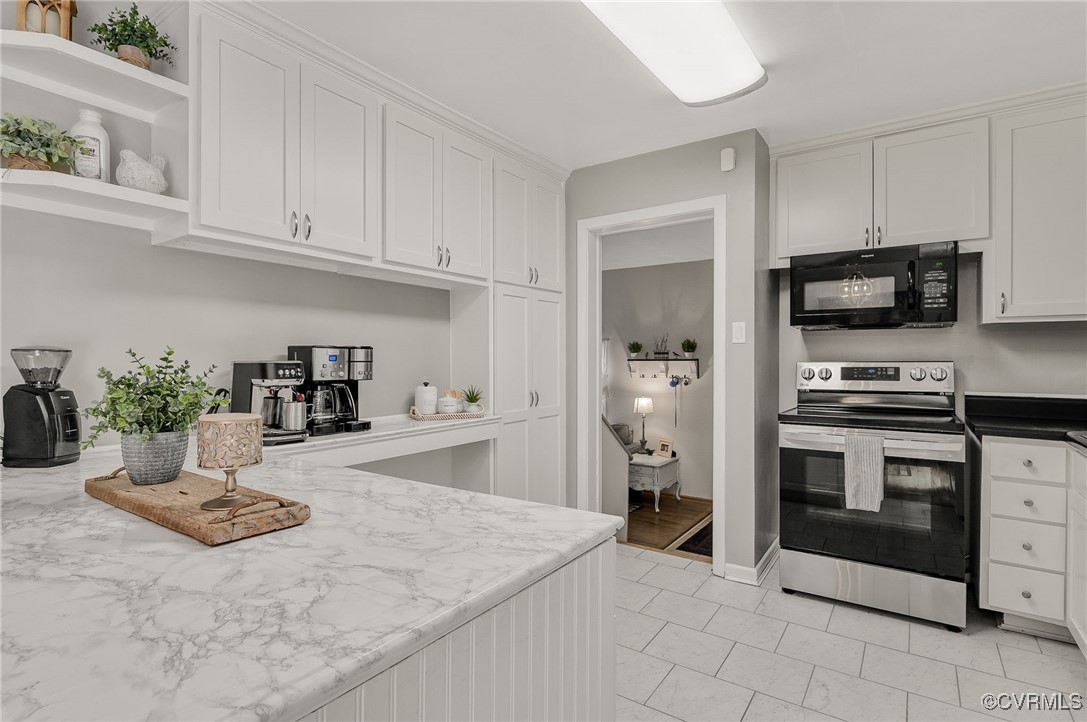 7503 Comet Road Henrico, VA 23294 - Photo 7 of 21 Kitchen featuring black microwave, stainless steel
