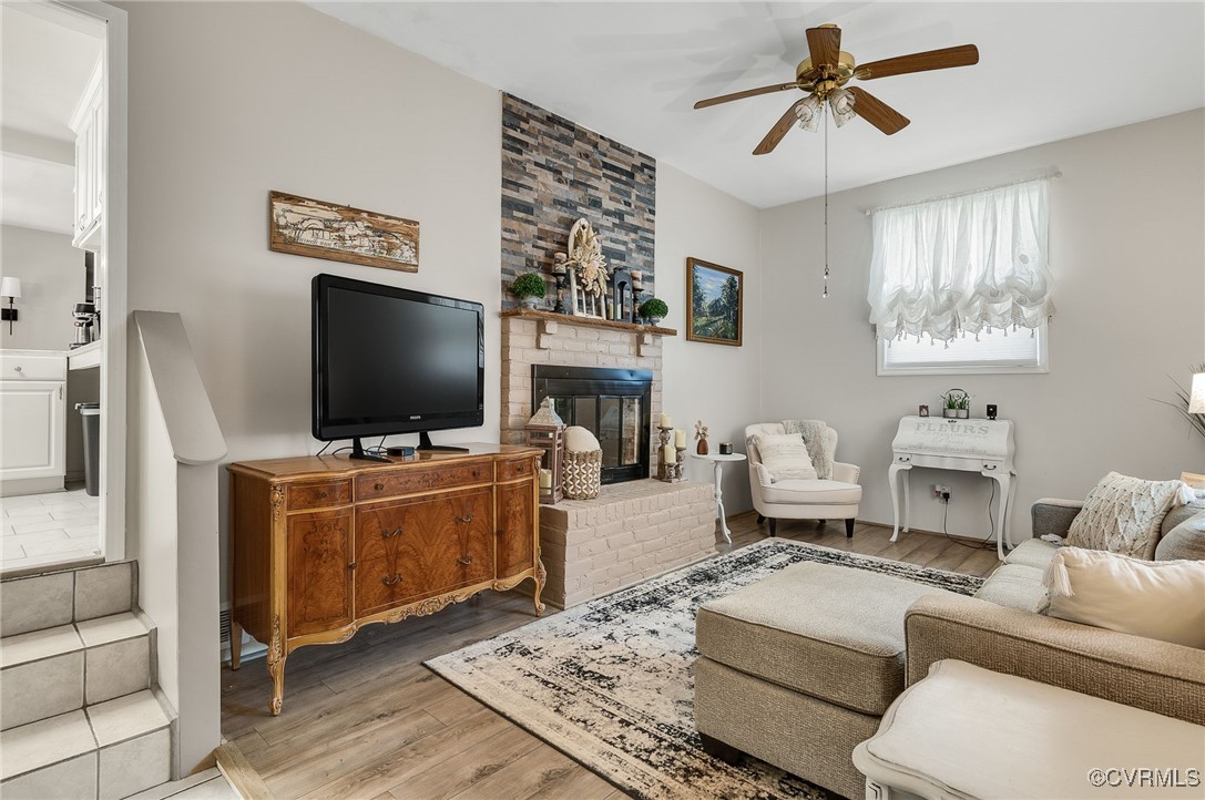 7503 Comet Road Henrico, VA 23294 - Photo 9 of 21 Living area featuring a fireplace, wood finished f