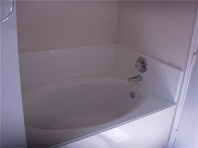 29614 North Legends Bend Lane Spring, TX 77386 - Photo 10 of 12 MASTER BATH FEATURES A GARDEN TUB AND SEPERATE SHOWER.
