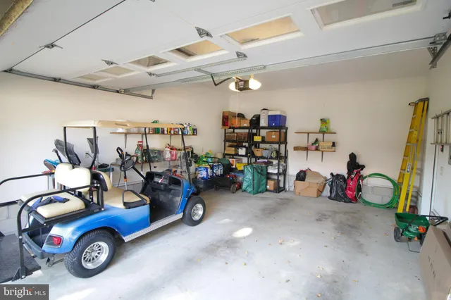 a view of parking garage with cars