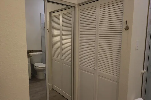 a bathroom with a toilet