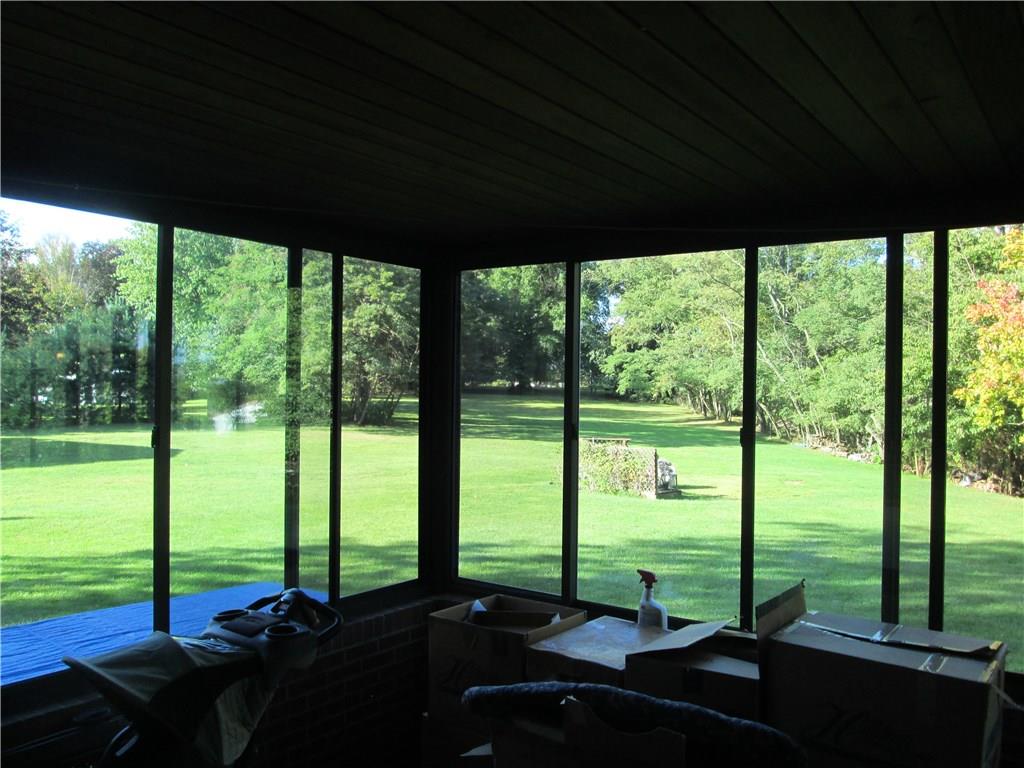 2340 Rochester Road Franklin Park, PA 15237 - Photo 21 of 24 Enclosed back porch overlooking backyard