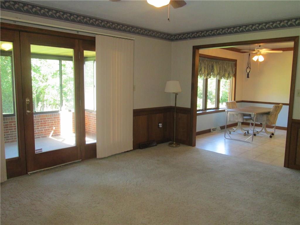 2340 Rochester Road Franklin Park, PA 15237 - Photo 10 of 24 Family Room - entry into screened in front porch