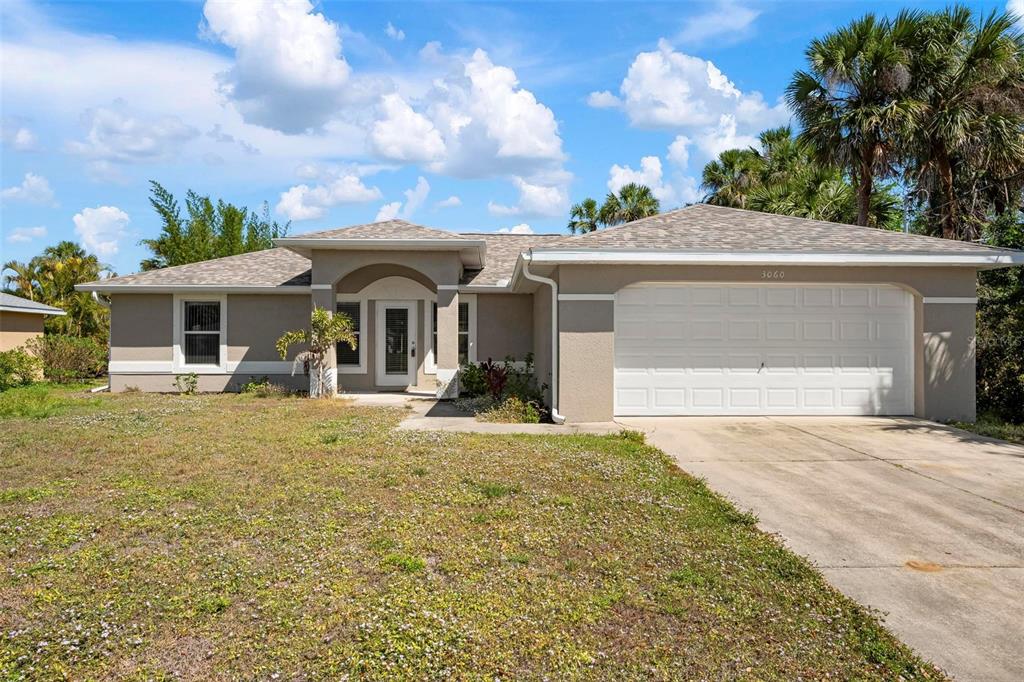 3060 Brewster Road North Port, FL 34288 - Photo 1 of 1 front view of a house with a yard
