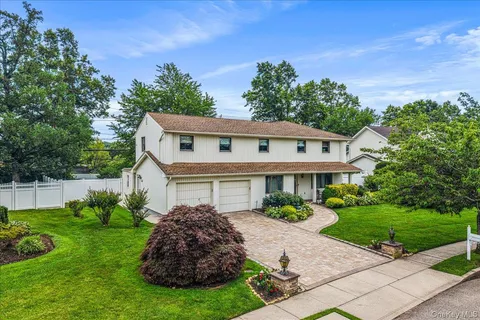 a view of a house with a garden