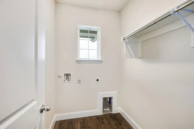 a view of bathroom with sink mirror and shower