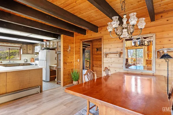 a bedroom with a bed and a chair