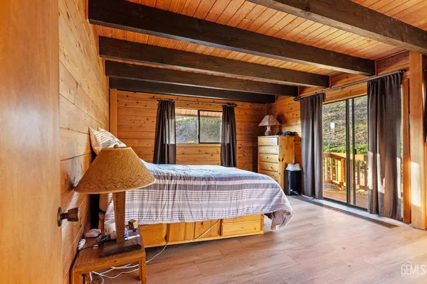 a view of deck with wooden floor and outdoor seating