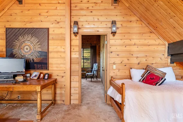 a backyard of a house with outdoor seating