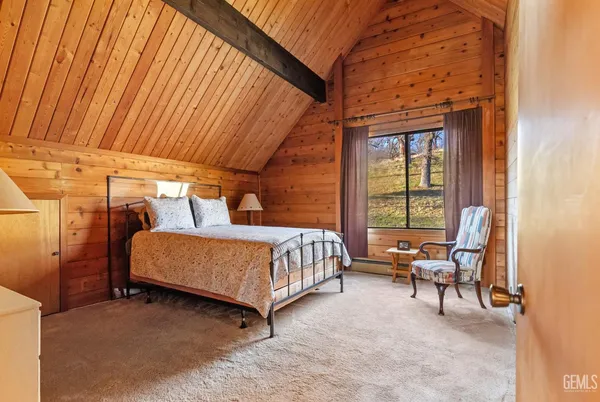 a view of a swimming pool with an outdoor seating