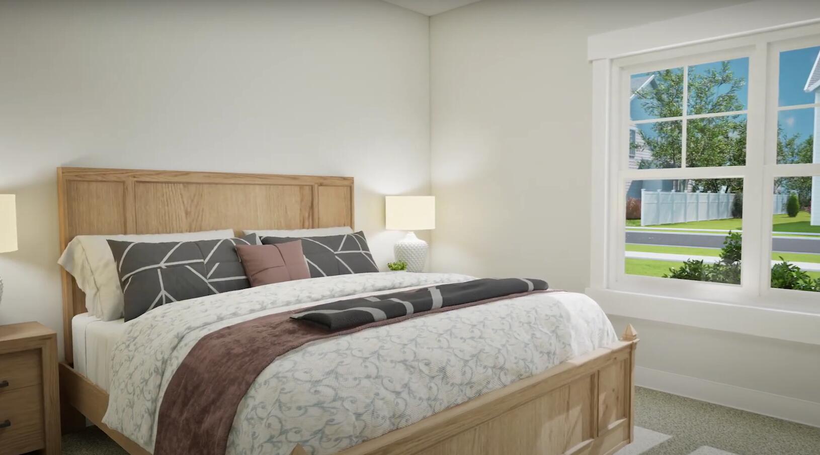 175 Sweetclover Street Freeport, FL 32439 - Photo 11 of 20 a bedroom with a large bed and a large window