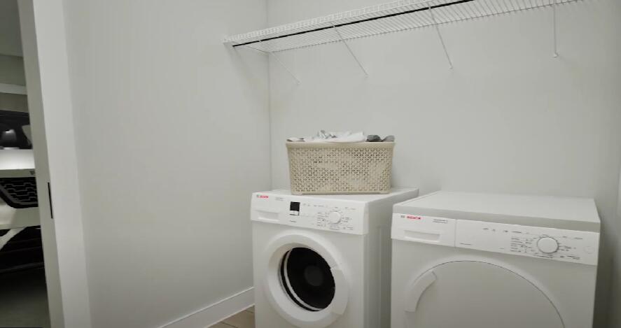 175 Sweetclover Street Freeport, FL 32439 - Photo 15 of 20 a utility room with dryer and washer