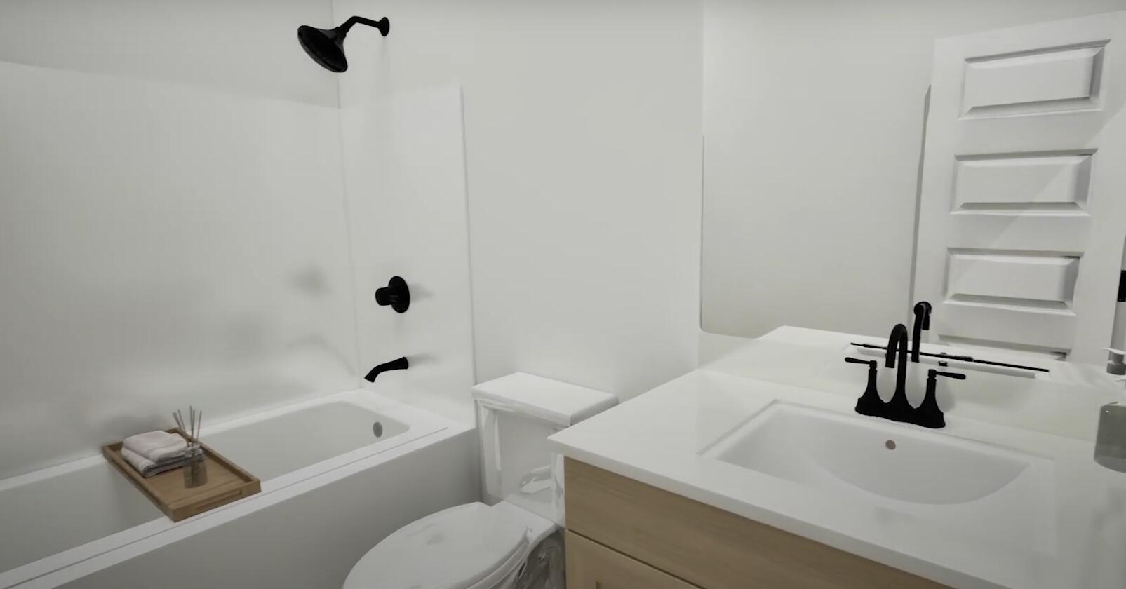 175 Sweetclover Street Freeport, FL 32439 - Photo 10 of 20 a bathroom with a sink a toilet and shower