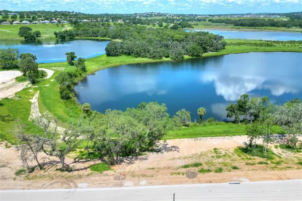 a view of a lake with a houses