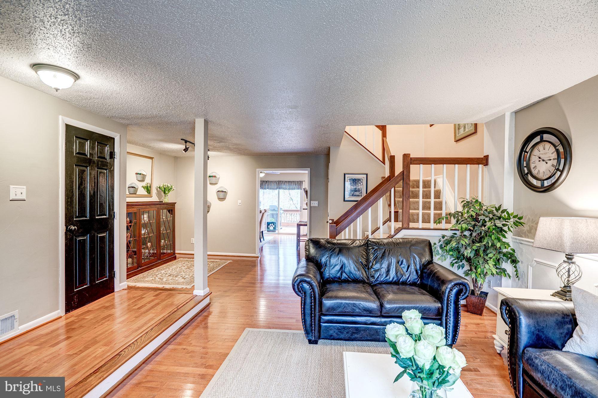 1614 Oak Spring Way Reston, VA 20190 - Photo 11 of 85 Living Room Looking in to Formal Dining Room