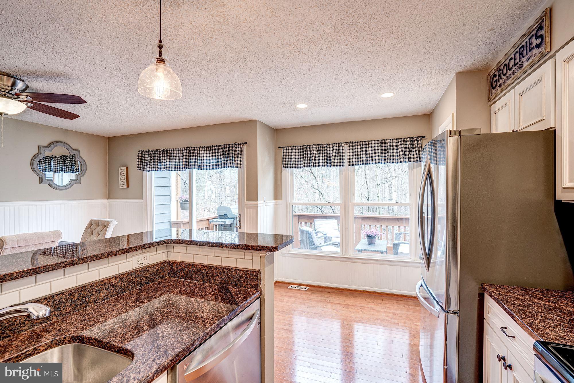 1614 Oak Spring Way Reston, VA 20190 - Photo 23 of 85 Kitchen is Lined with a Wall of Windows; SO SUNNY!