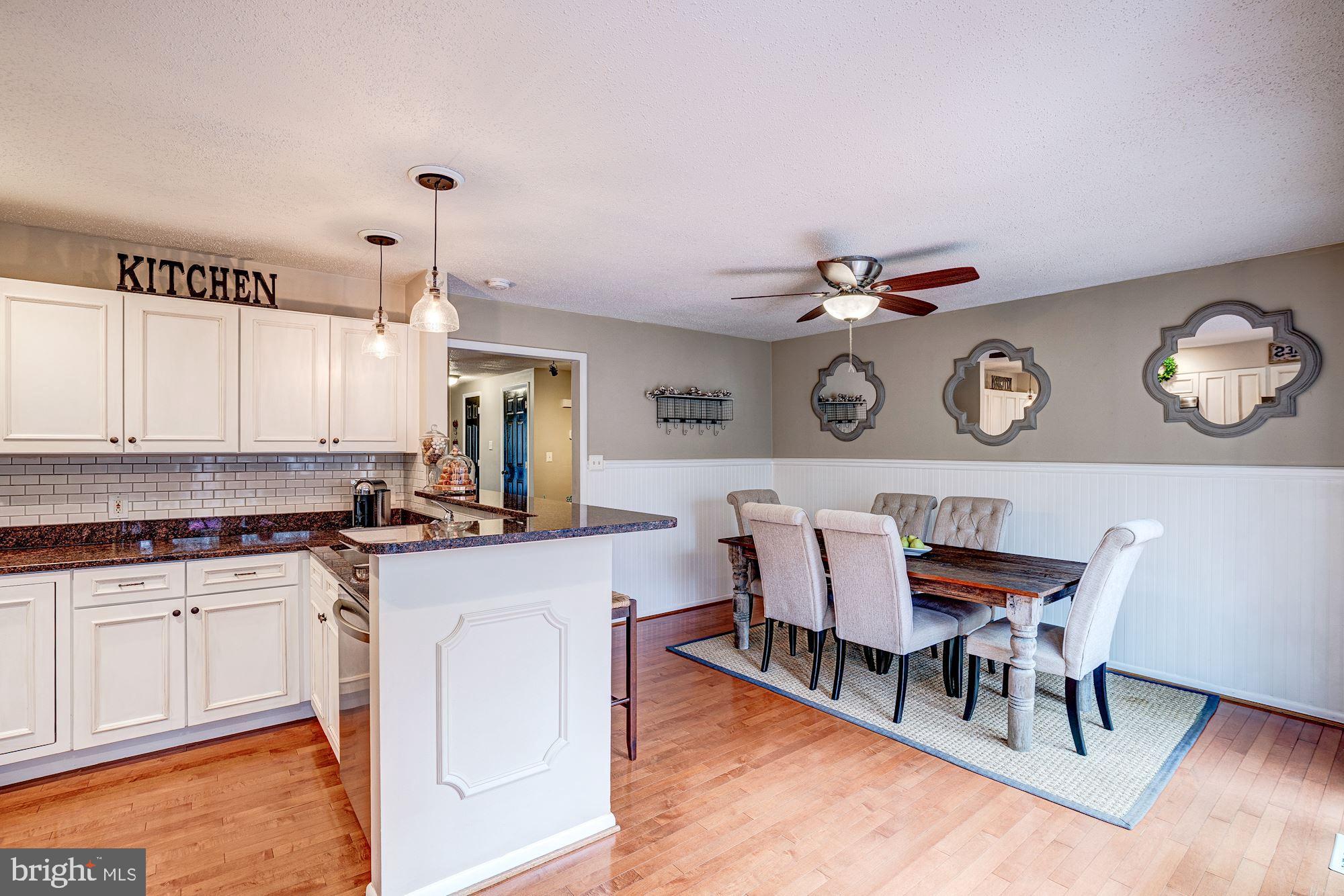 1614 Oak Spring Way Reston, VA 20190 - Photo 24 of 85 Kitchen Features Breakfast Bar for Casual Dining!