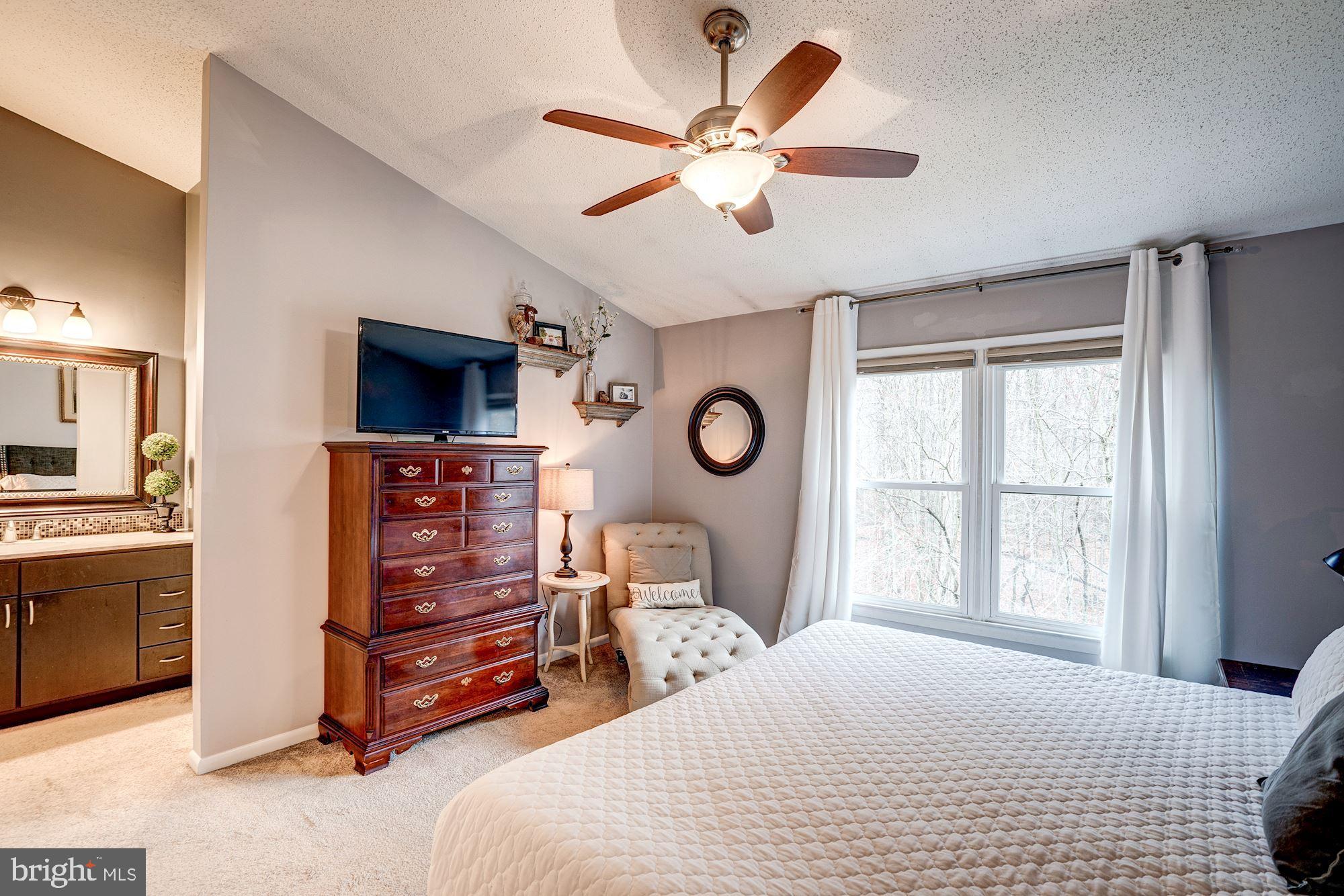 1614 Oak Spring Way Reston, VA 20190 - Photo 35 of 85 Master BR - Large Windows w/ Serene Wooded View!