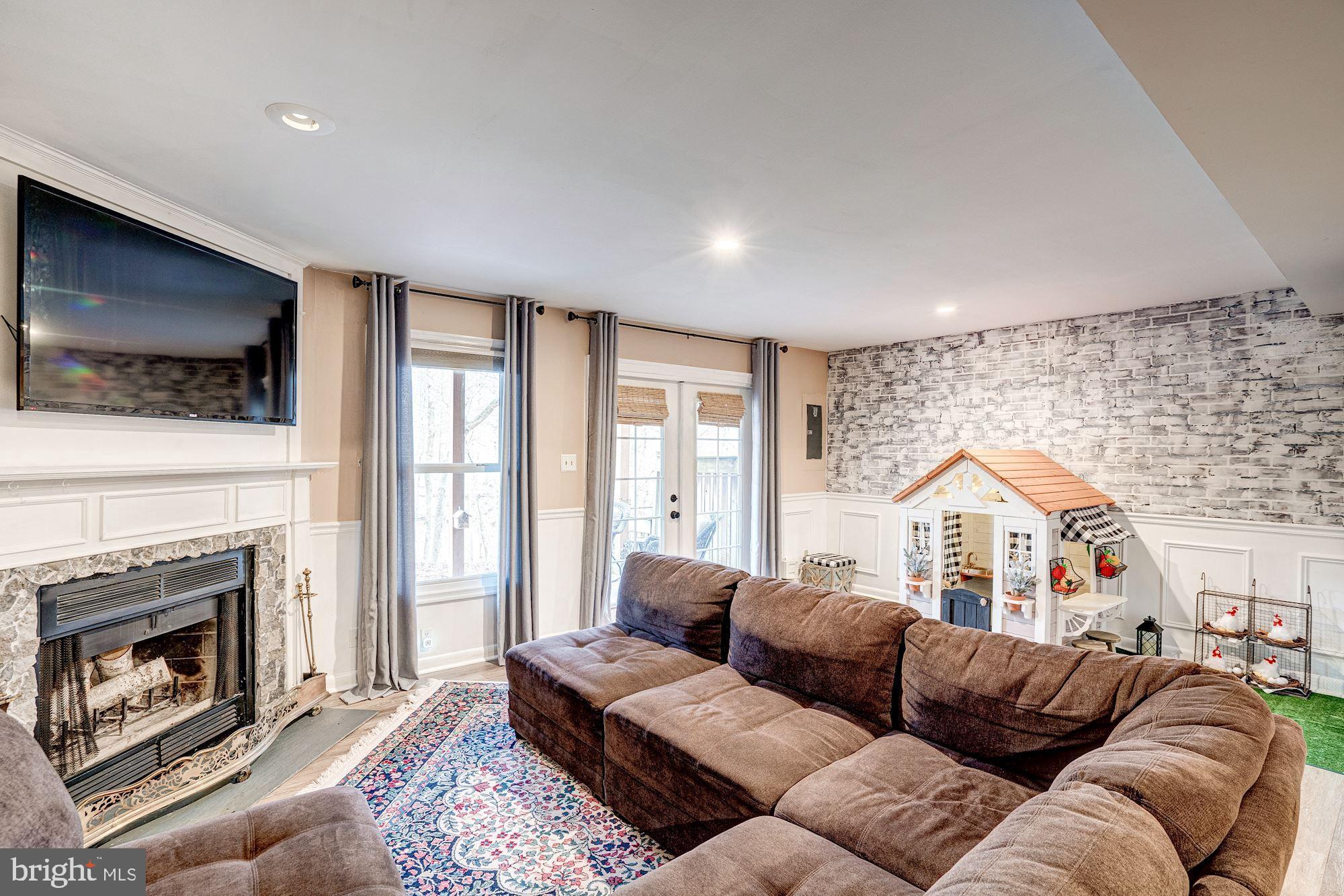 1614 Oak Spring Way Reston, VA 20190 - Photo 56 of 85 Family Room - Newer Floors, Wood Burning Fireplace