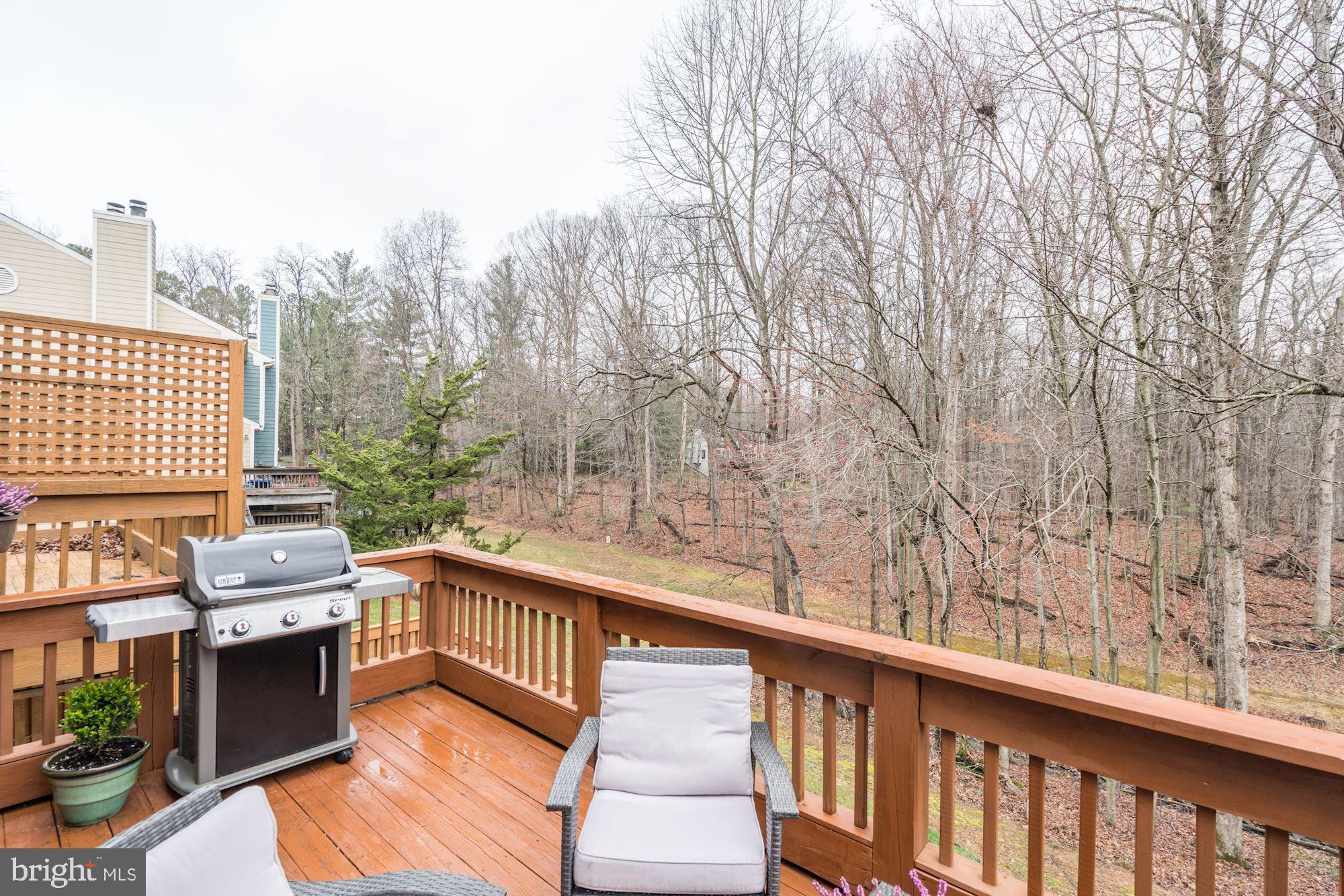 1614 Oak Spring Way Reston, VA 20190 - Photo 71 of 85 Deck w/ Absolutely Stunning & Serene Wooded Views!