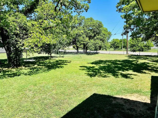 a view of a garden with an outdoor space