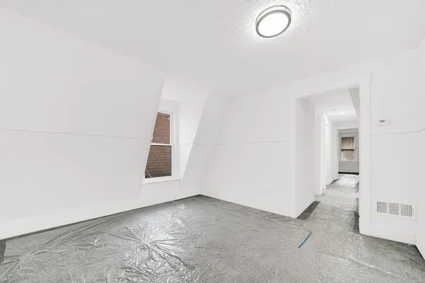 an empty room with windows
