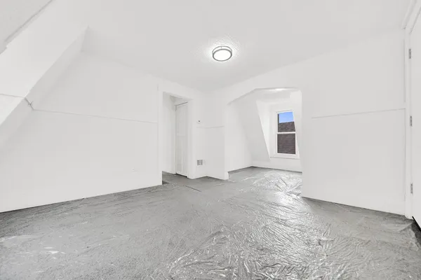 an empty room with a natural light
